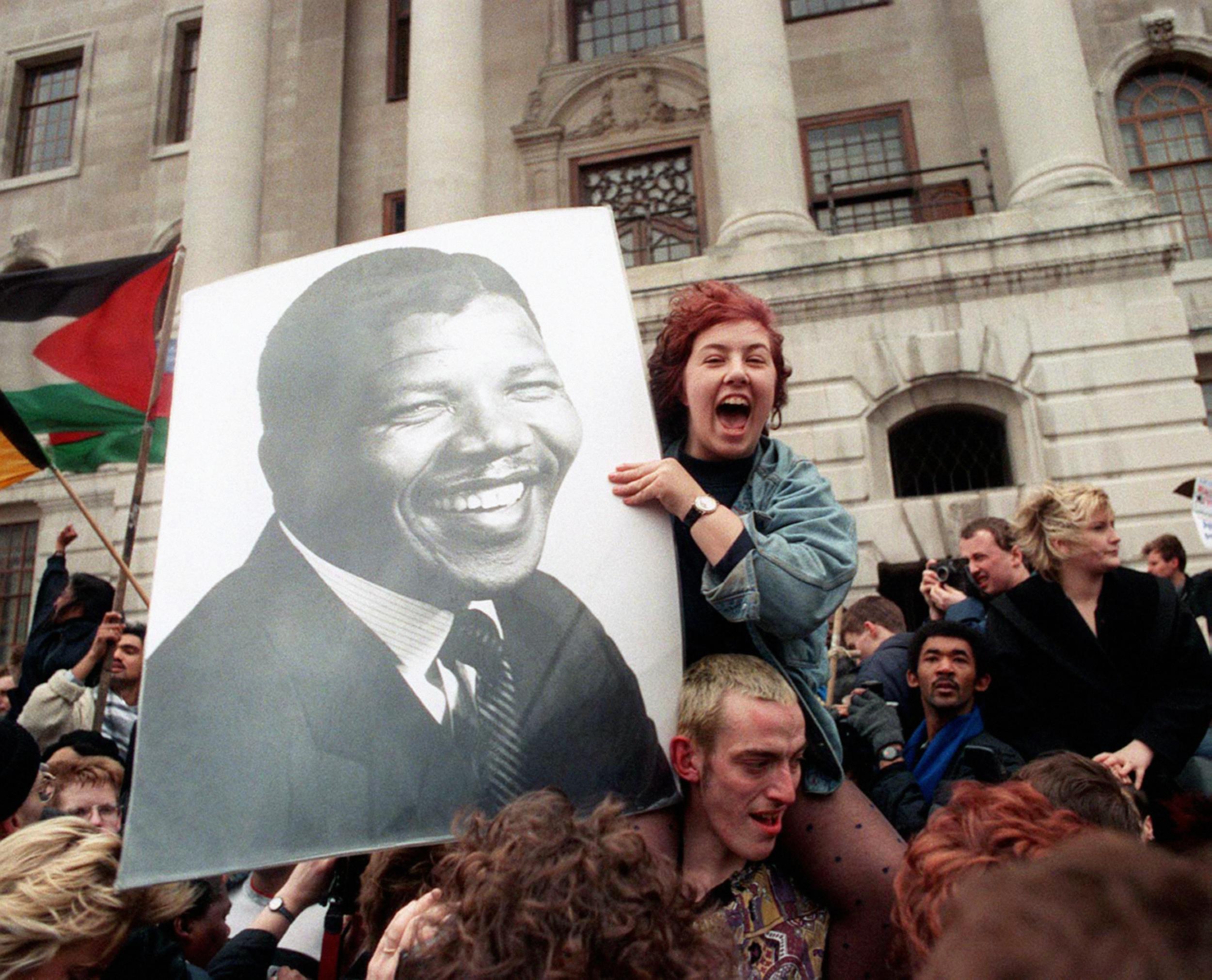 Crowds celebrate Mandela’s release in Trafalgar Square in 1990