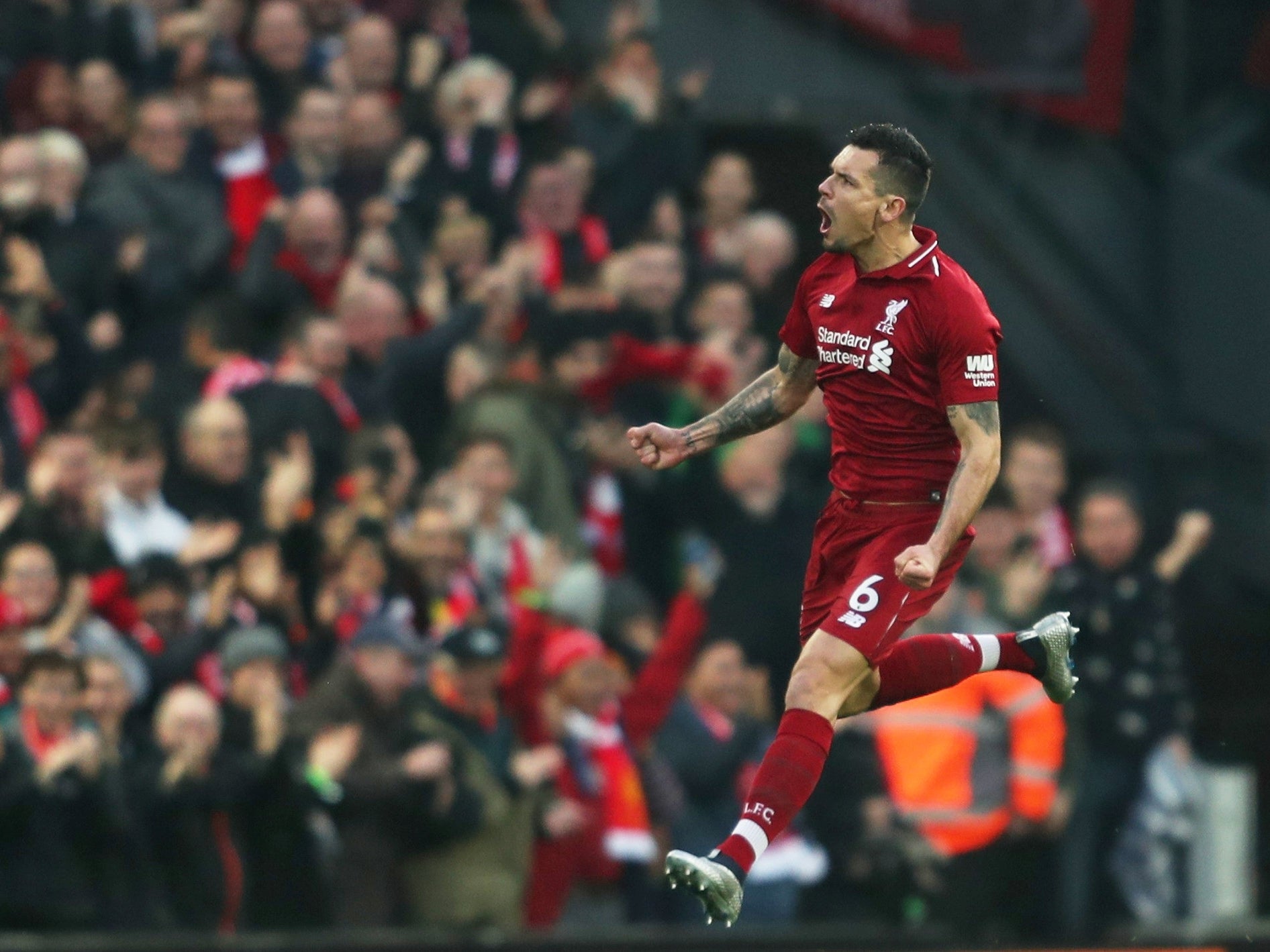 Lovren celebrates after scoring the opener against Newcastle