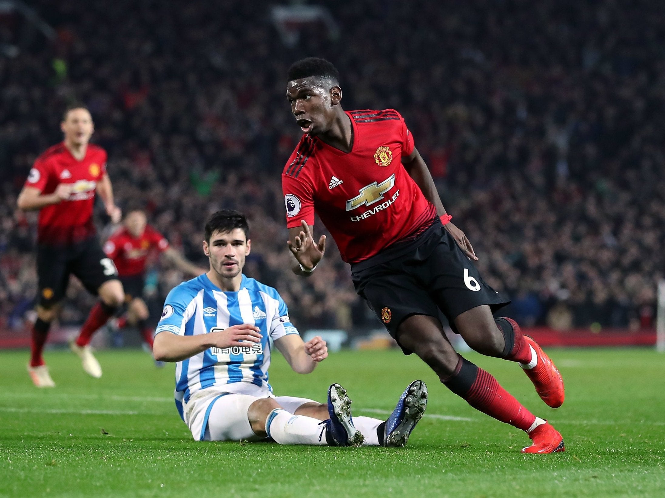Pogba peels away to celebrate after scoring Manchester United's second goal