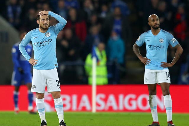 David Silva of Manchester City looks dejected after Leicester City score