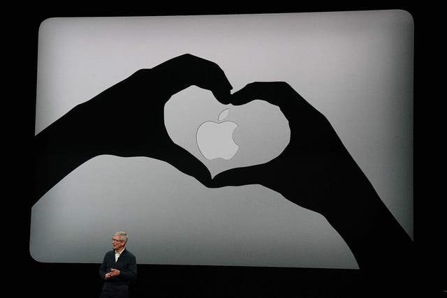 Apple CEO Tim Cook presents new products, including new Macbook laptops, during a special event at the Brooklyn Academy of Music in New York