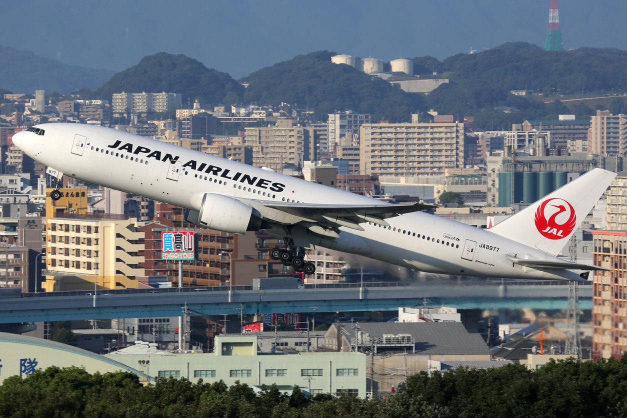 A JAL flight takes off from Fukuoka in Japan