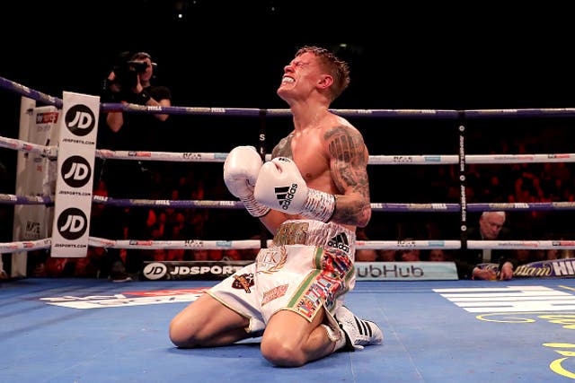 Charlie Edwards celebrates after the final bell rings in the 12th round