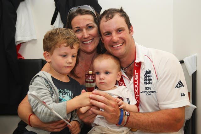 Andrew Strauss of England poses with wife Ruth and children Samuel and Luca
