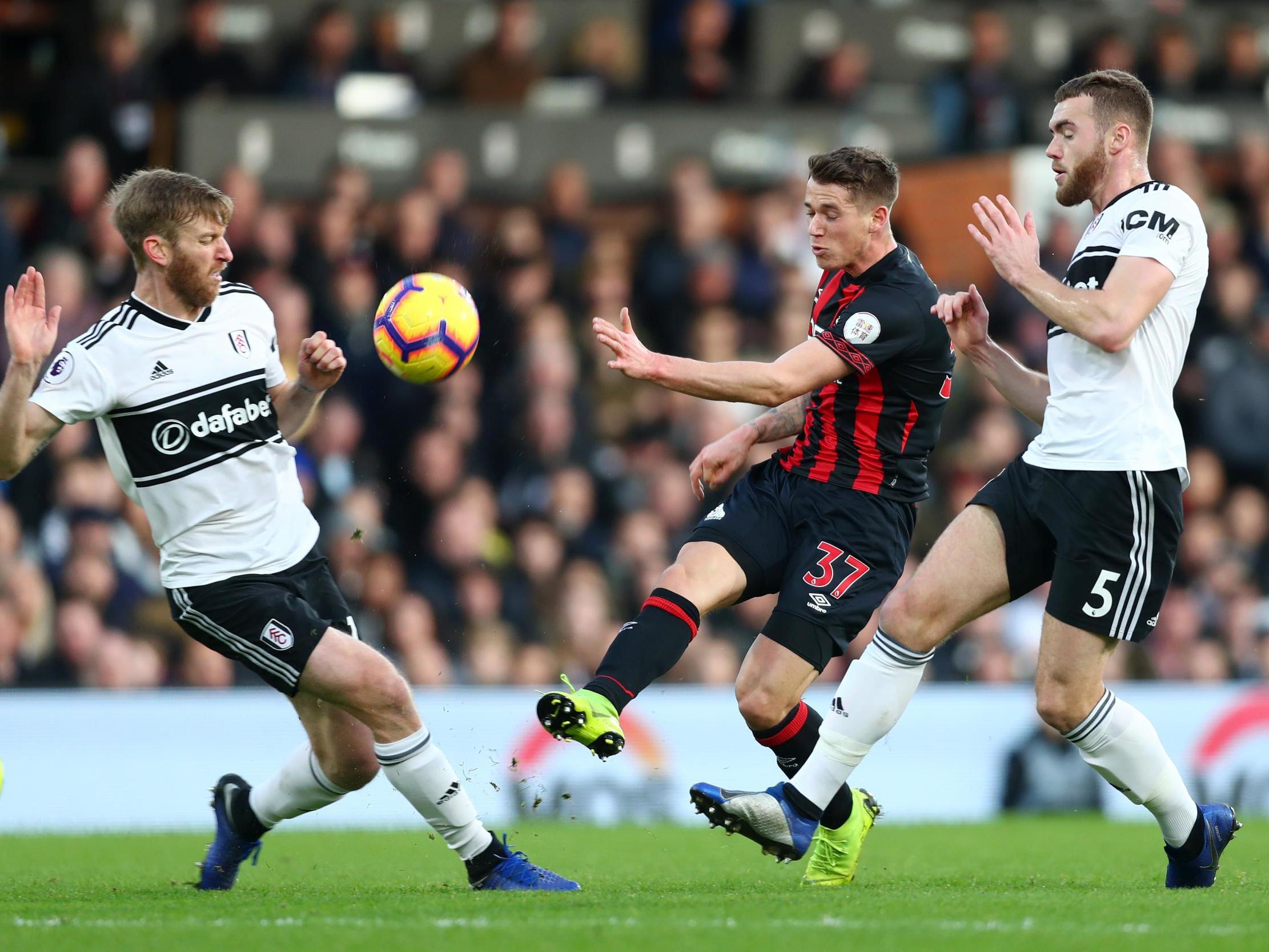 Eric Durm takes a shot on goal for Huddersfield