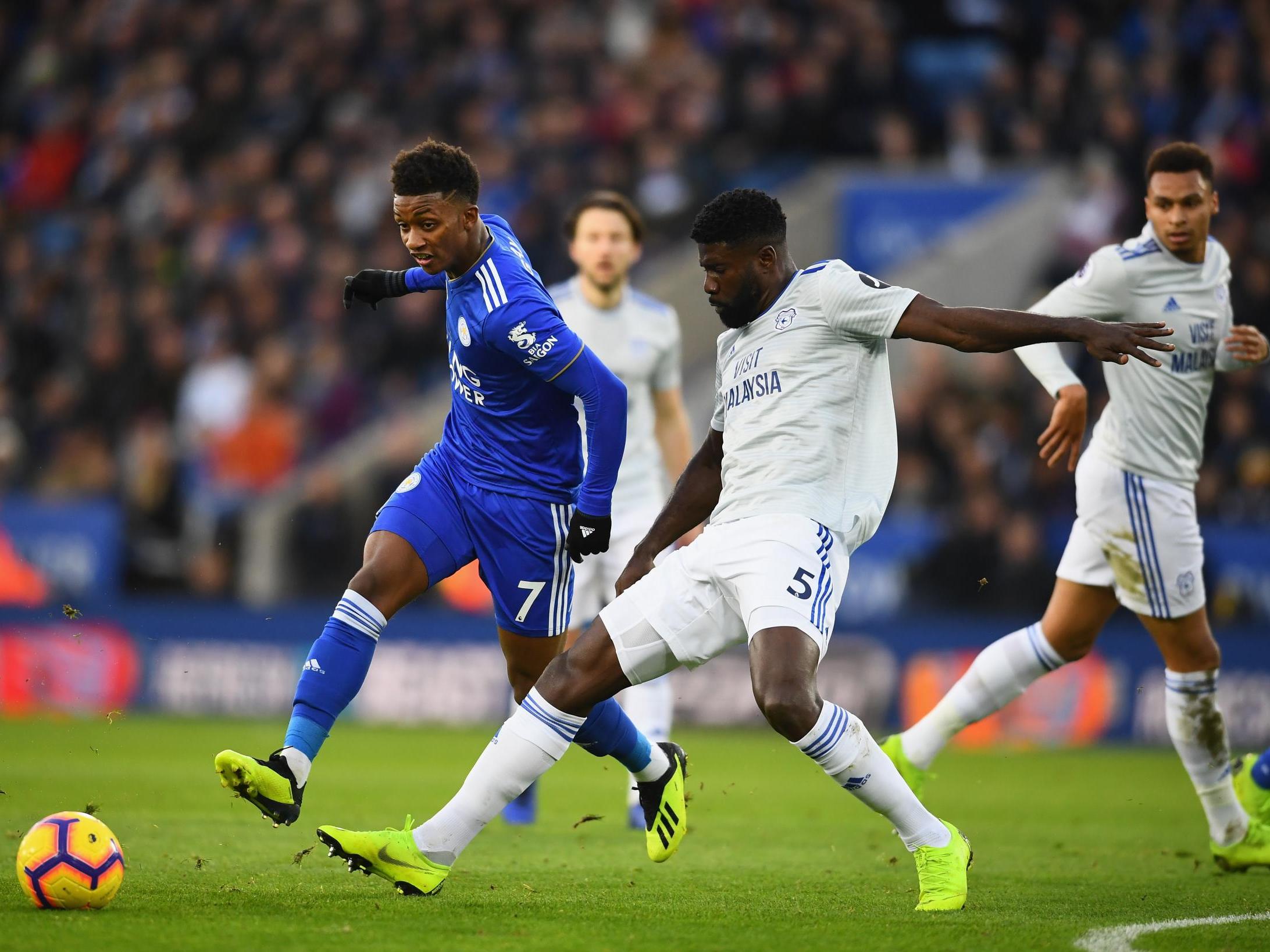 Demarai Gray attempts to get past Bruno Ecuele Manga