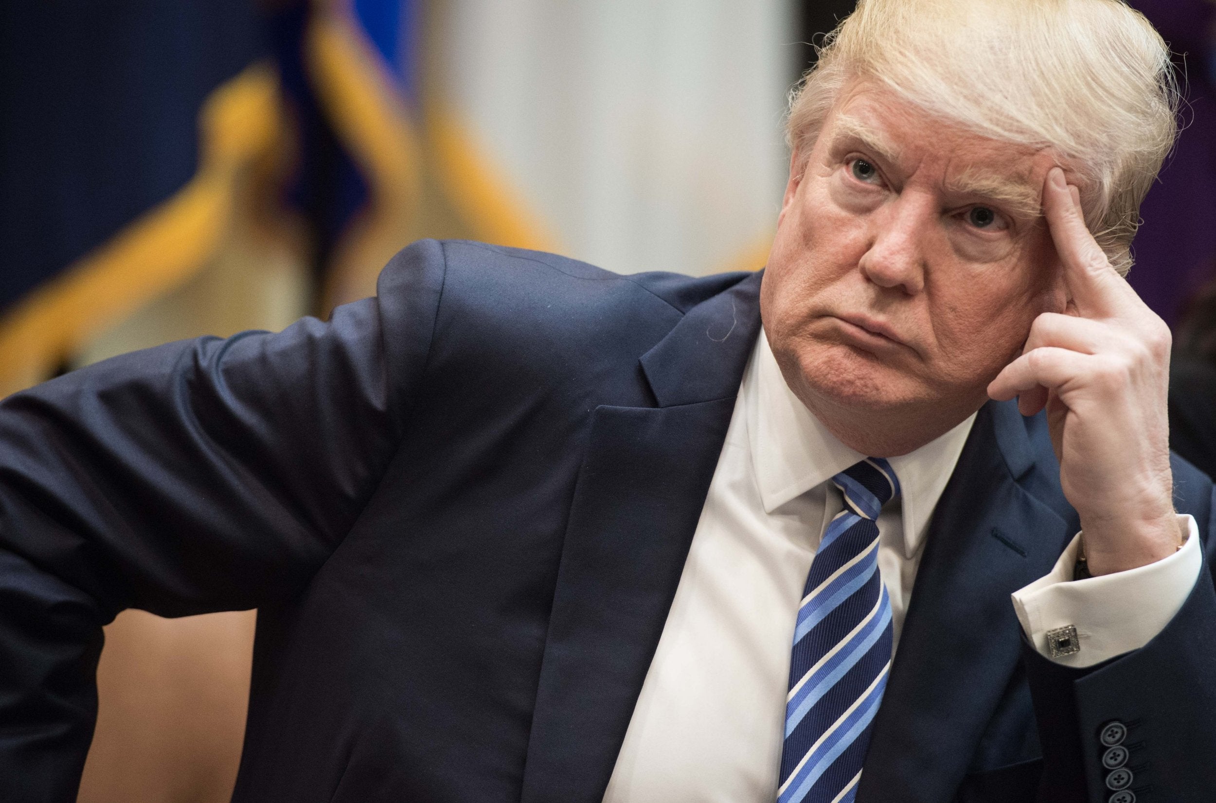 In this file photo taken on March 13, 2017 US President Donald Trump attends a meeting about healthcare