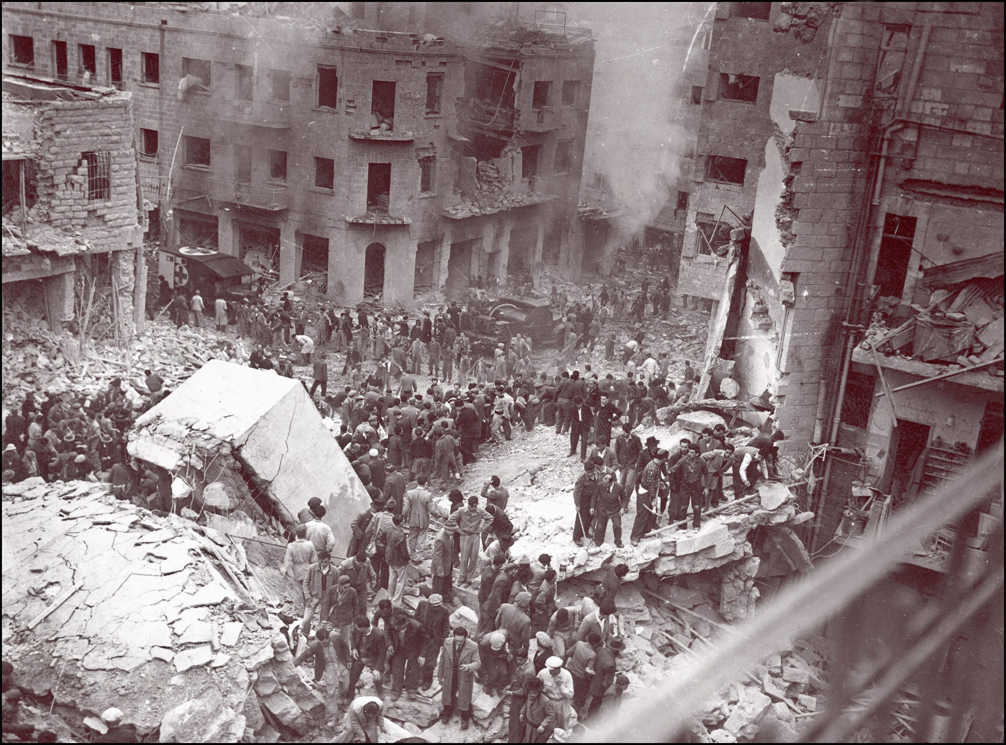 Jewish rescuers among the destroyed buildings of Jerusalem in 1948