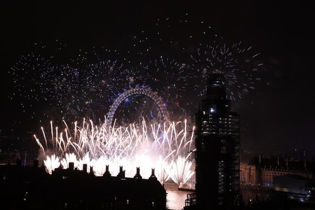 Fireworks explode over Westminster Abbey and Elizabeth Tower near Parliament as Big Ben marks the start of 2019