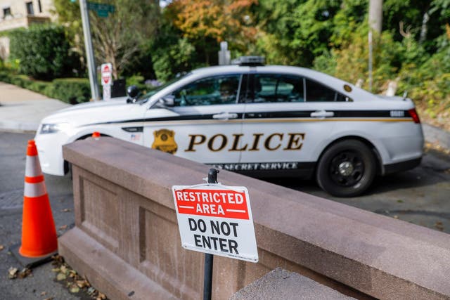 A police patrol car is positioned in the street near the private resident of former US President Barack Obama in Washington, DC, USA, 24 October 2018. A suspicious package sent to Obama's home were among several discovered and intercepted