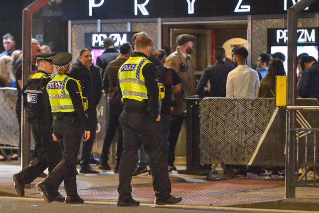 Police patrol outside a nightclub in Leeds on New Year’s Eve