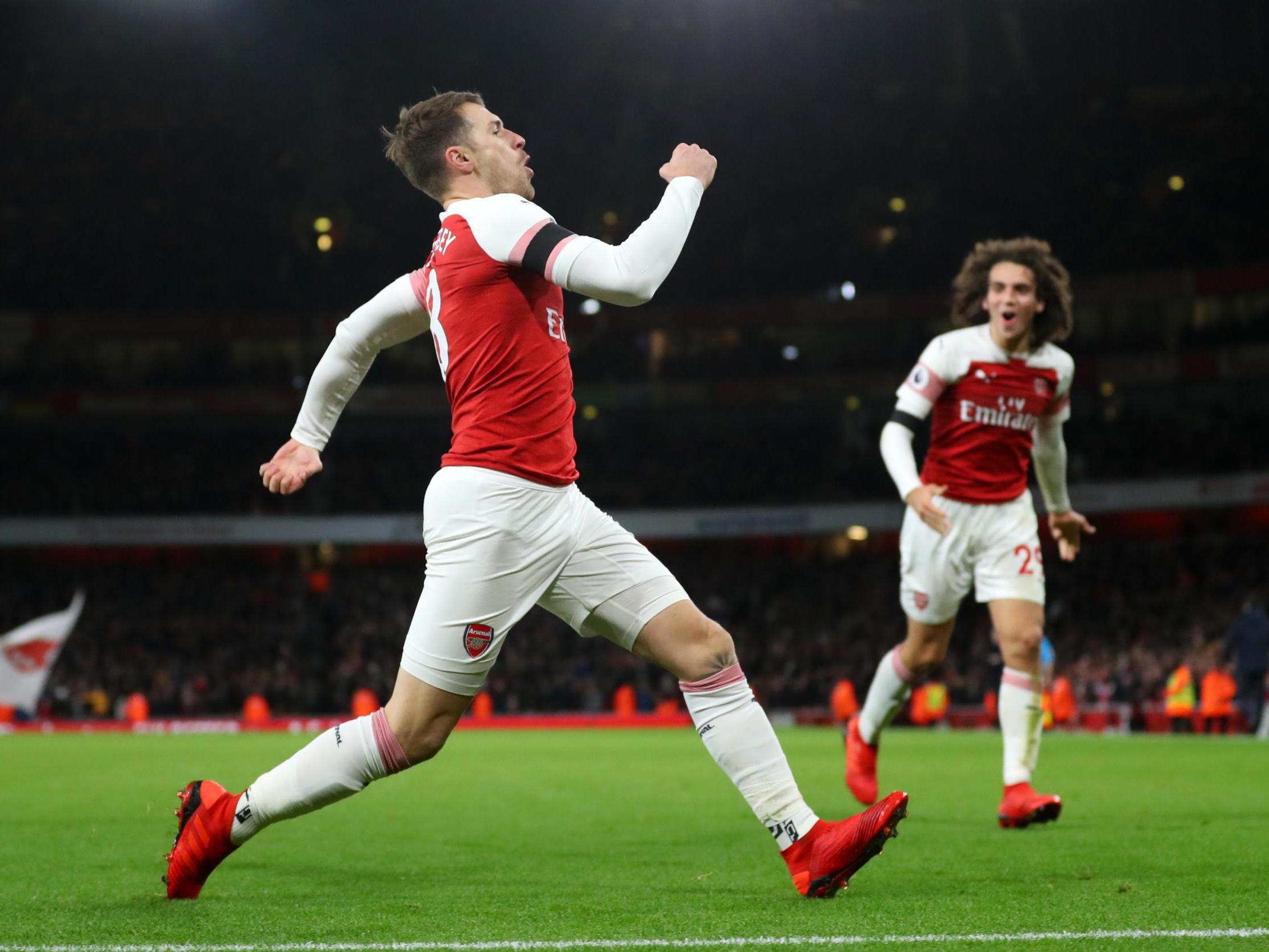 Aaron Ramsey celebrates scoring Arsenal's third goal of the game