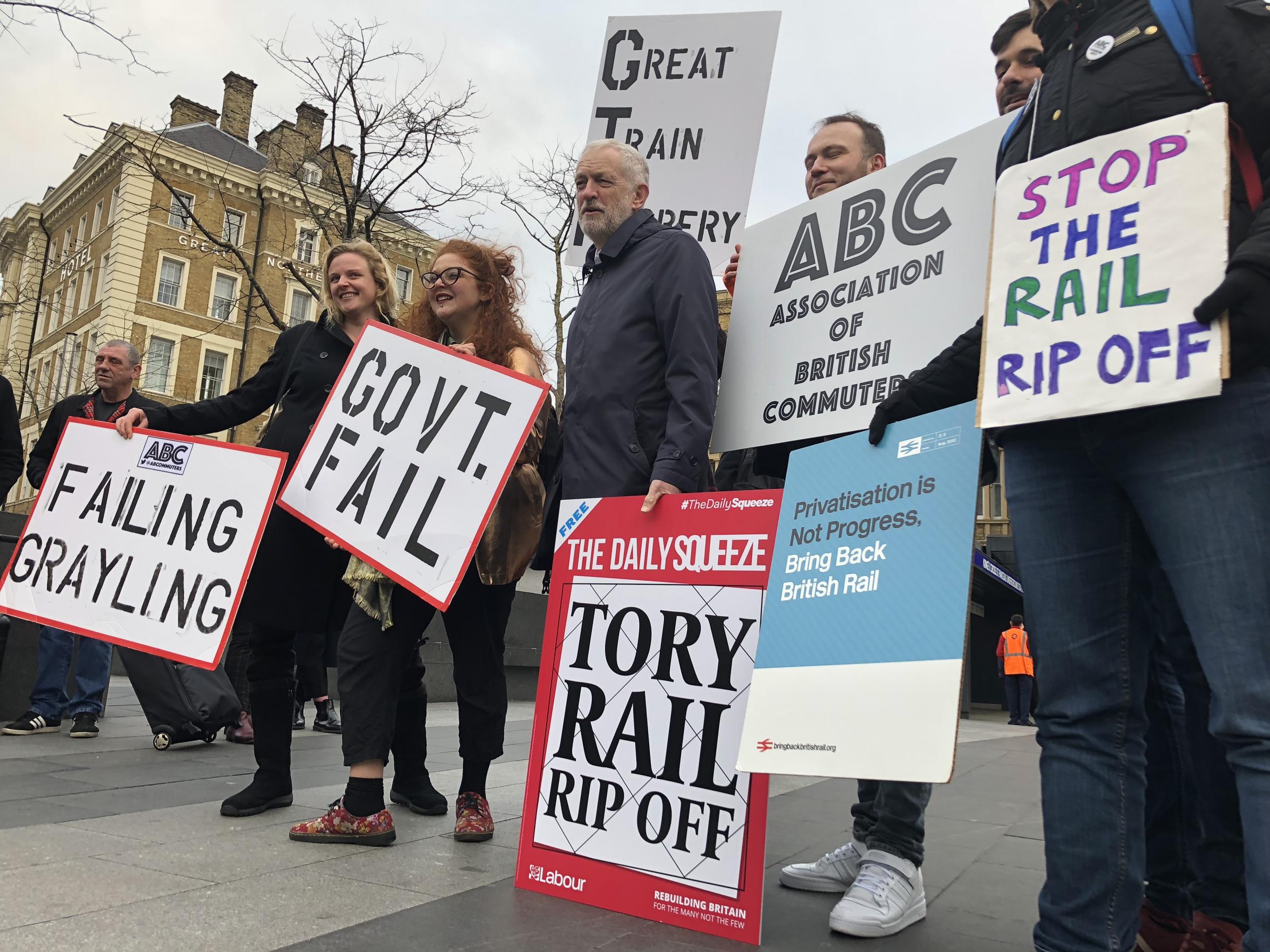 Action station: Jeremy Corbyn with protesters outside King's Cross Station in London