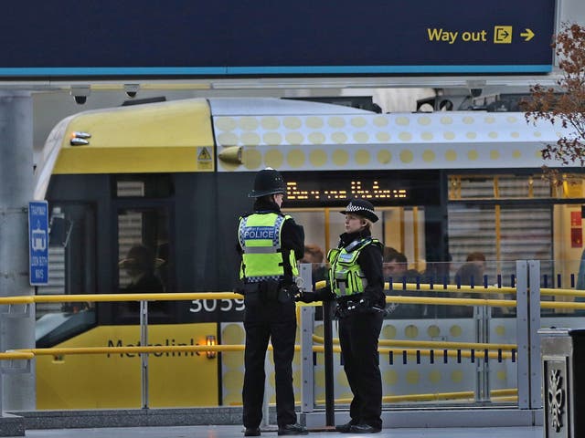 Officers tackled the armed attacker at the busy Metrolink station to ensure he was immediately detained
Officers at the Manchester Victoria Metrolink station, where three people were stabbed on New Year’s Eve