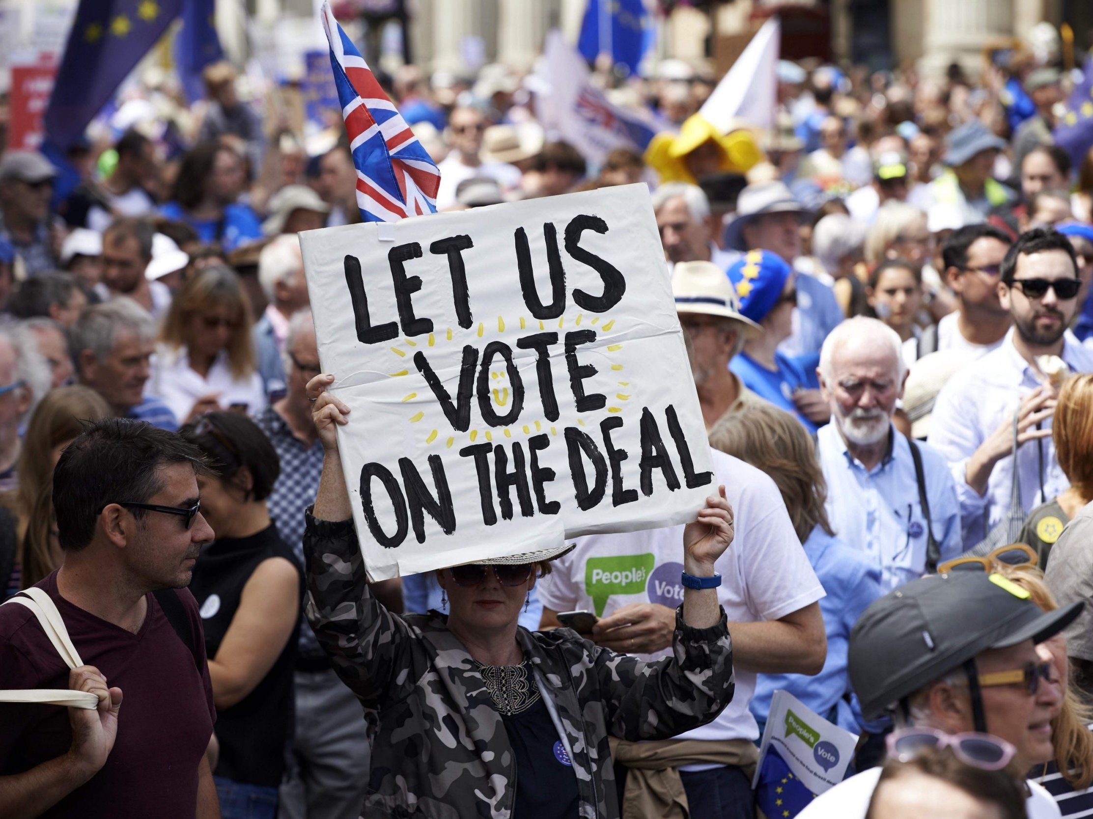 Demonstrators carry banners and flags as they participate in a march calling for a Final Say on the Brexit deal
