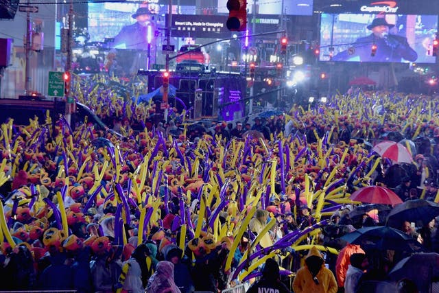 Revelers enjoy the concerts during New Year's Eve at Times Square celebrations on 31 December 2018 in New York