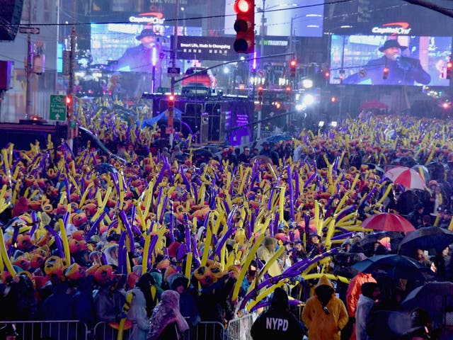 Revelers enjoy the concerts during New Year's Eve at Times Square celebrations on 31 December 2018 in New York