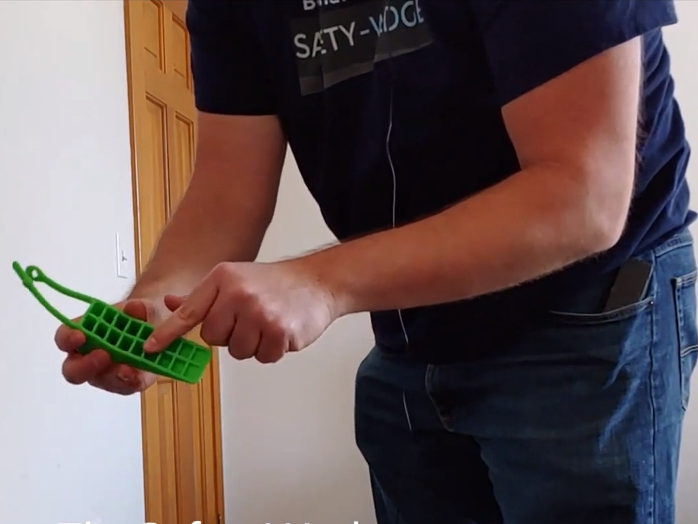 Ryan Bowman demonstrates the internal rubber structure of the wedge, which he says stops it sliding