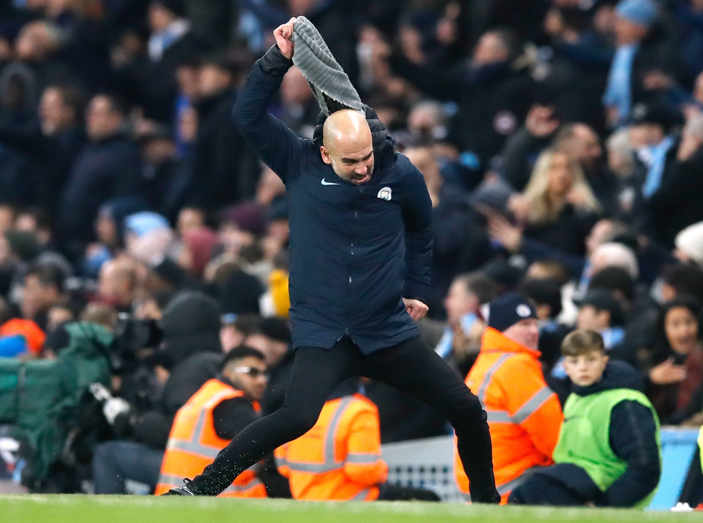 Guardiola was almost sent to the stands in the second half after throwing his scarf in anger