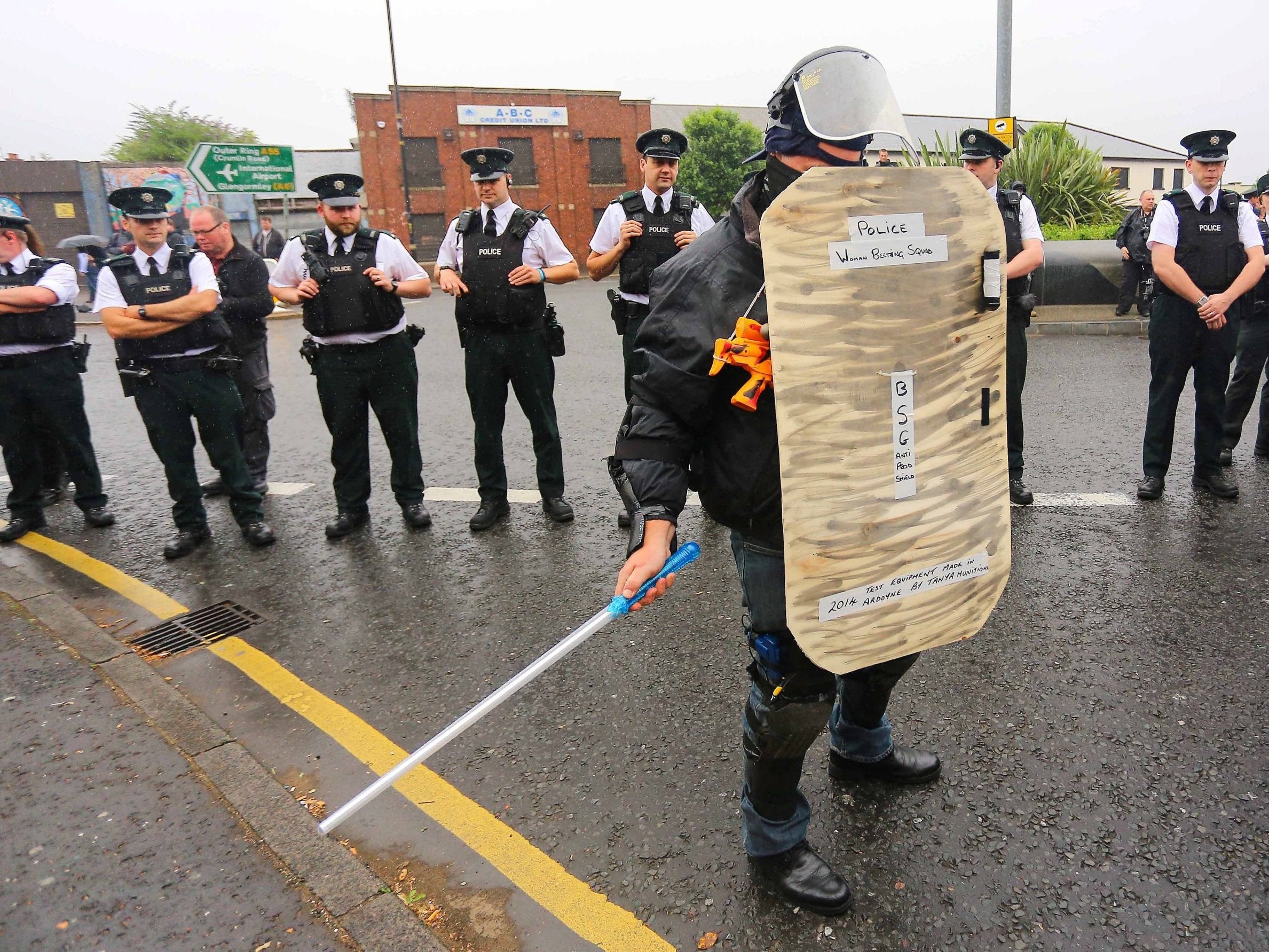Police stand by during the Orangmen's march in Belfast in 2014; PSNI has asked up to 1,000 officers to be deployed in Northern Ireland as a reinforcement in case of a no-deal Brexit
