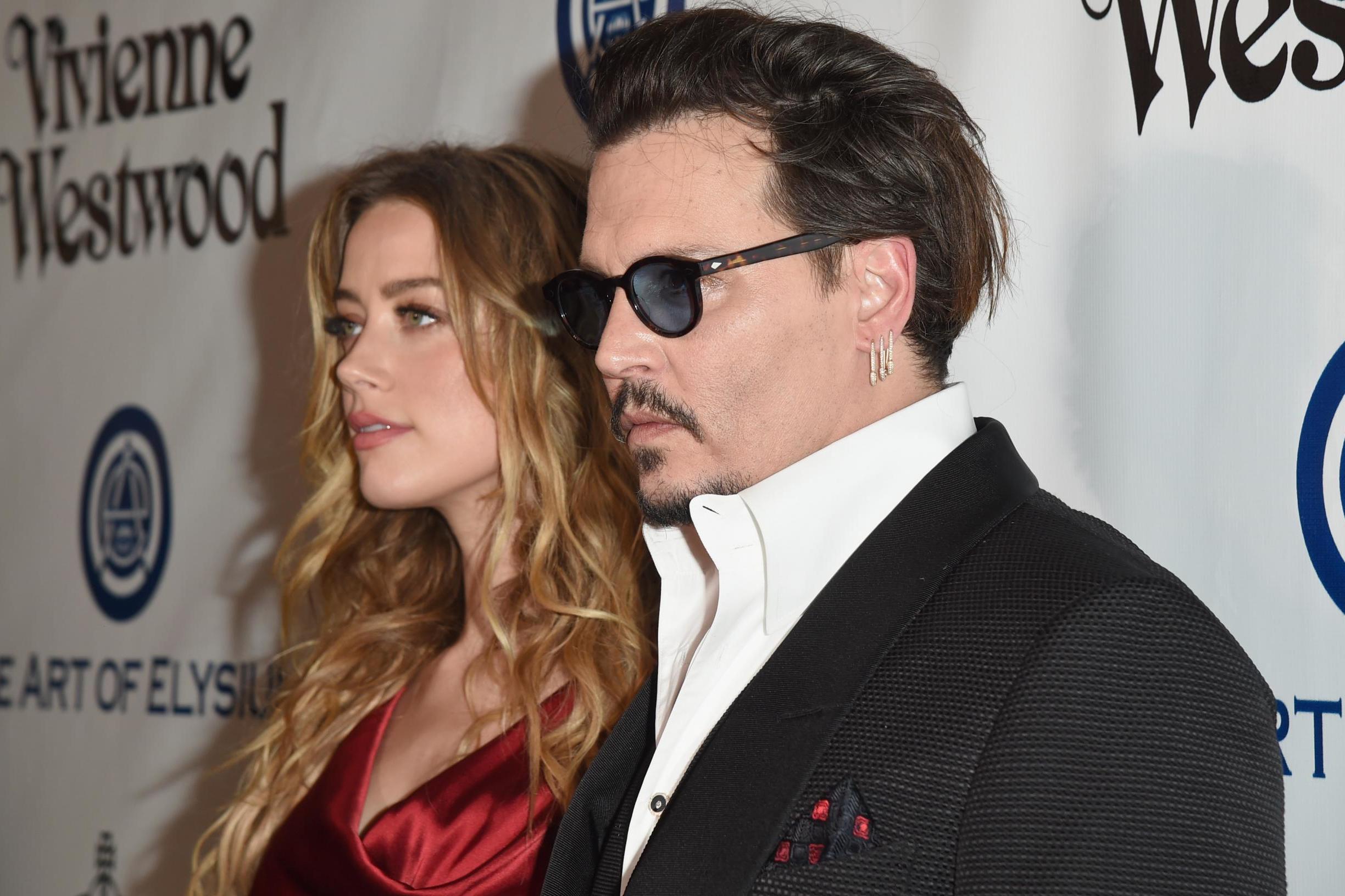 Actors Amber Heard and Johnny Depp attend The Art of Elysium 2016 HEAVEN Gala presented by Vivienne Westwood & Andreas Kronthaler at 3LABS on 9 January, 2016 in Culver City, California.