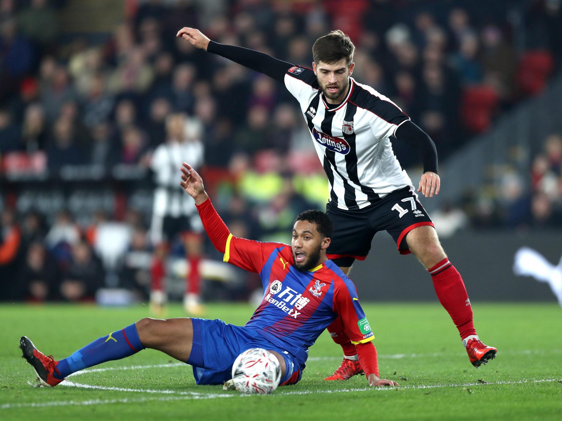 Jairo Riedewald is brought down by Harry Cardwell