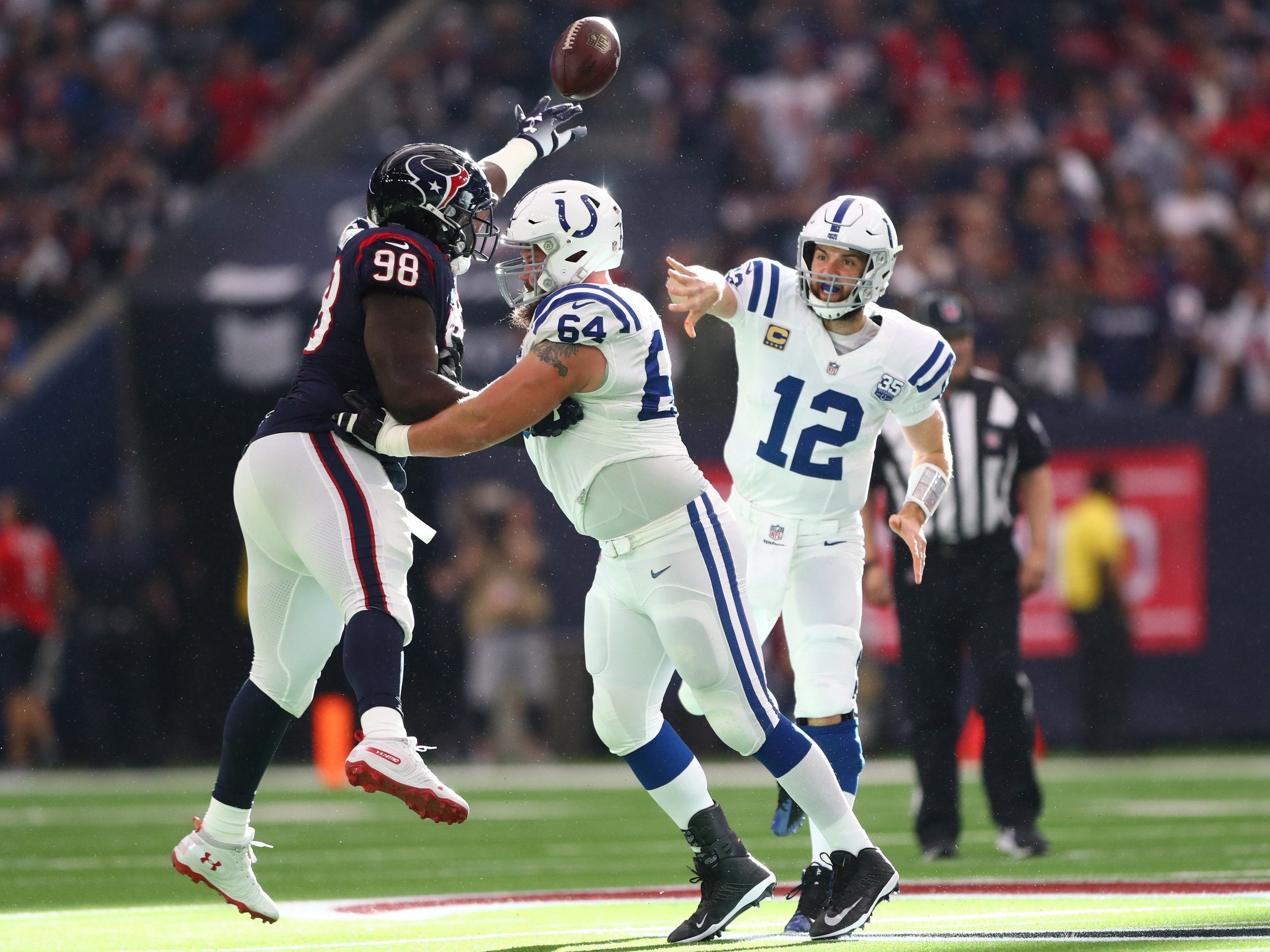 Luck threw for 222 yards and two touchdowns to see the Colts past the Texans