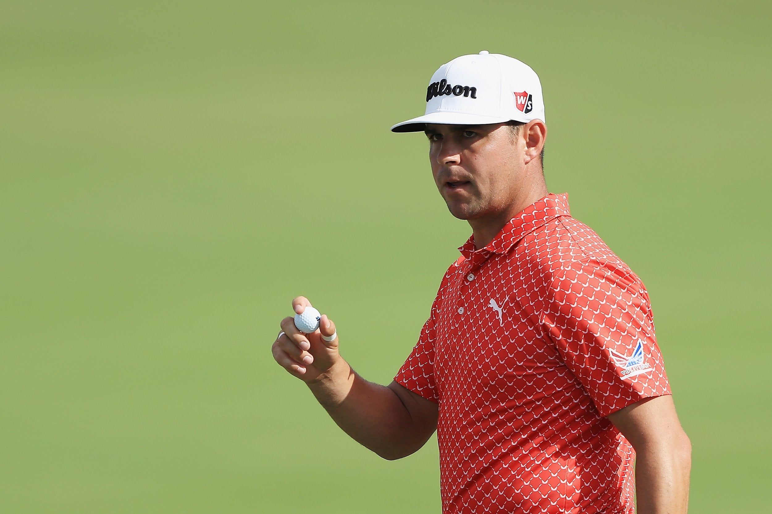 Gary Woodland holed a 65-foot eagle putt on the 15th