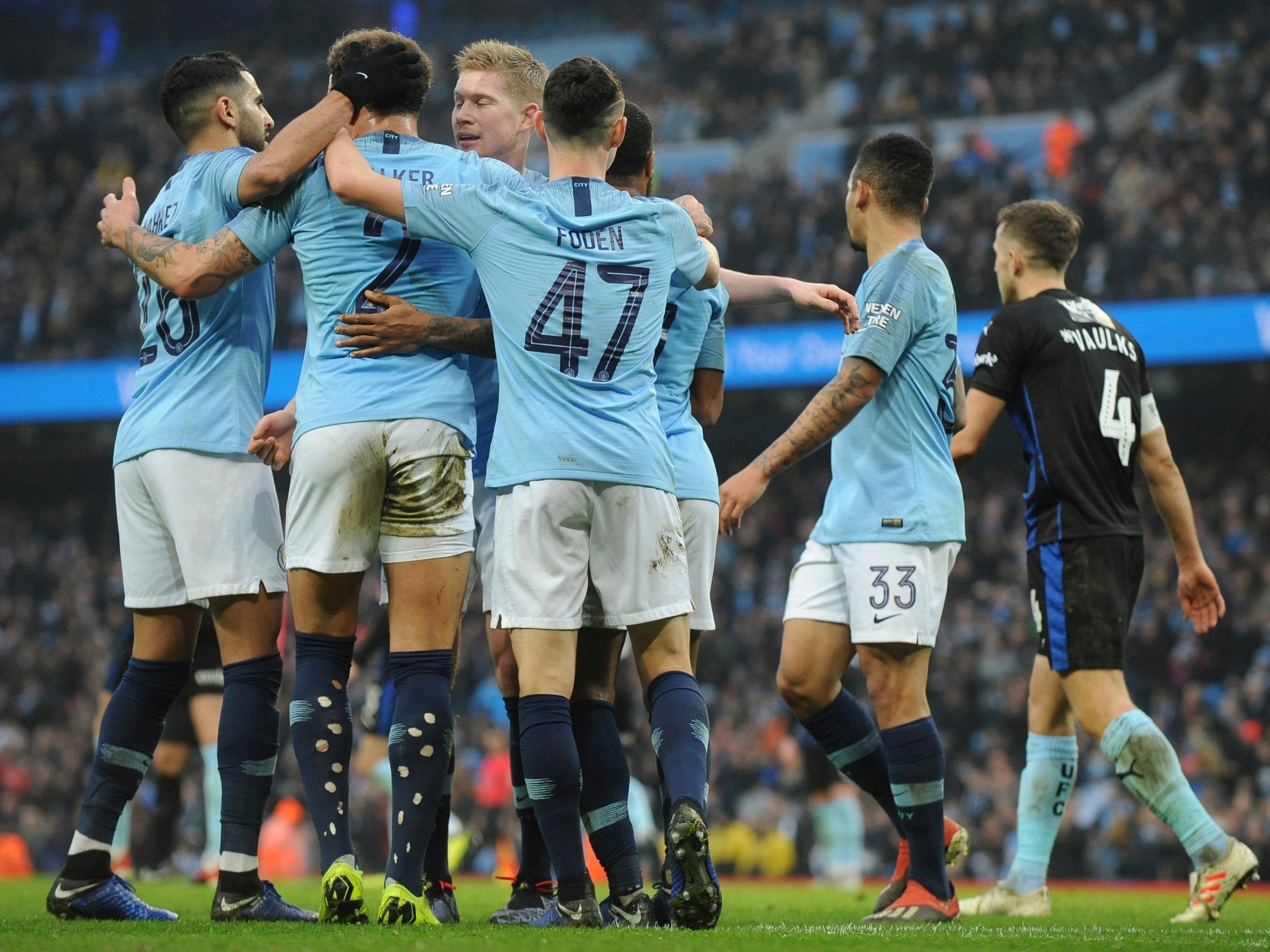 Manchester City players celebrate Foden's effort