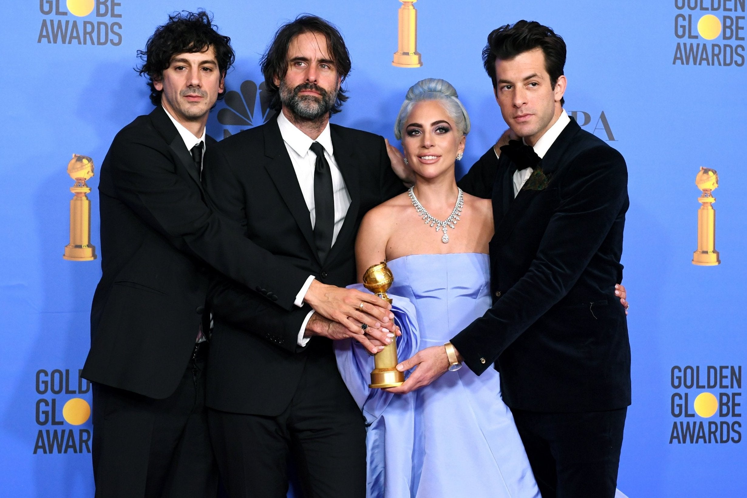 (l-r) Anthony Rossomando, Andrew Wyatt, Lady Gaga, and Mark Ronson backstage after accepting the award for Best Original Song - Motion Picture at the 2019 Golden Globes