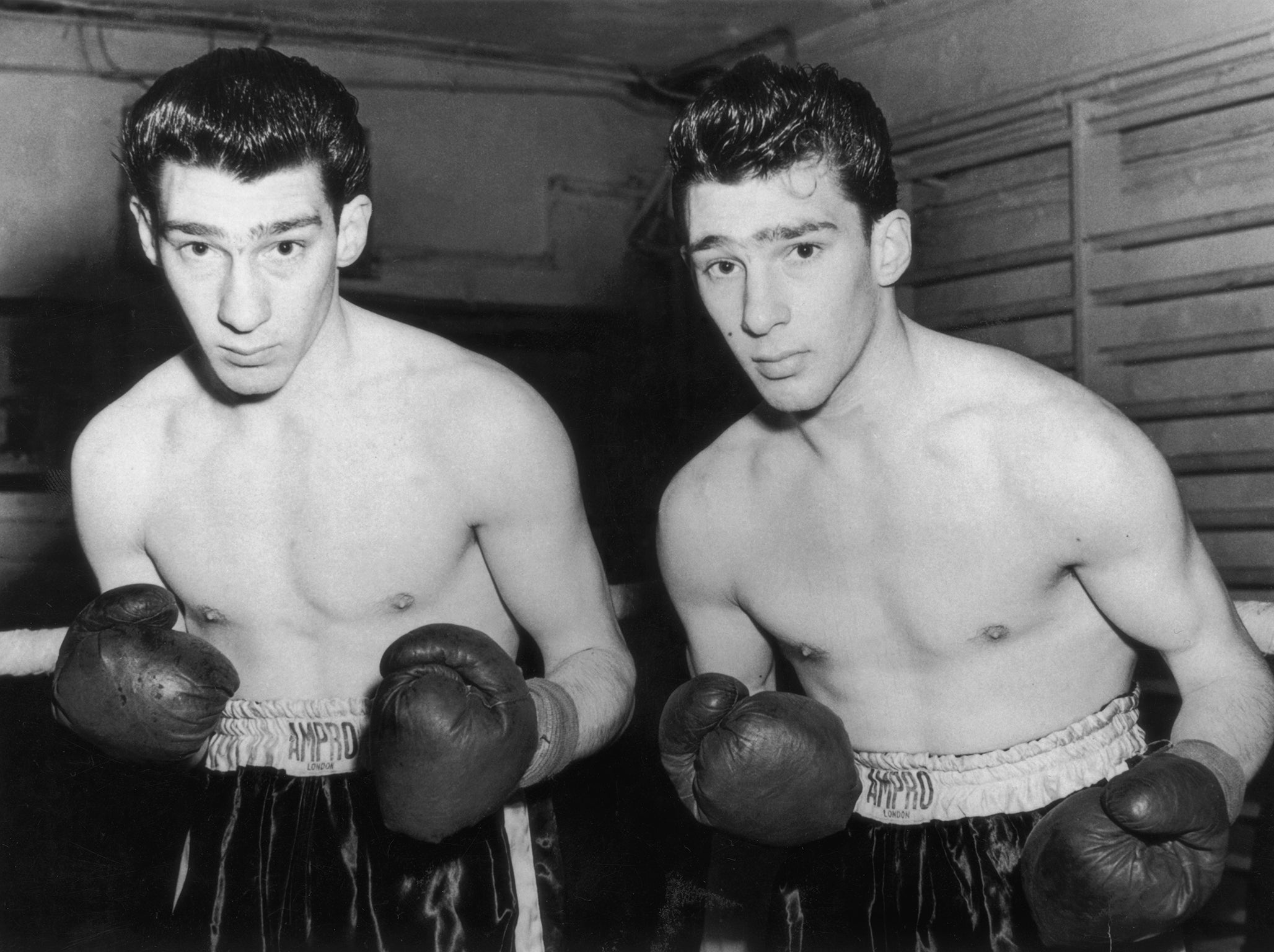 Ronnie (left) and Reggie began their careers in the boxing ring