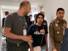 Saudi woman seeking asylum barricades herself inside Thai hotel room