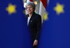 May wrestles with EU and Tory rebels in scramble to save Brexit deal