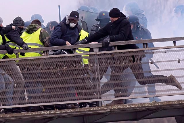 Gilets jaunes protesters engaged in violent clashes with French gendarmes in Paris on Saturday