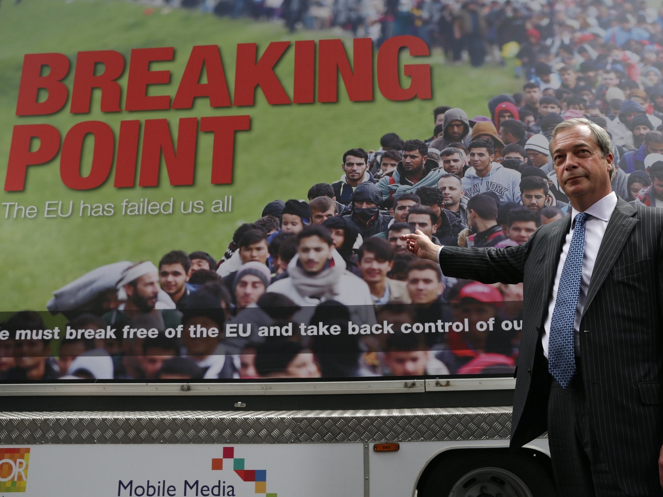 Divisive: Nigel Farage unveils his immigration poster in June 2016