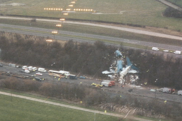 Crash site: the Boeing 737 came down beside the M1, just short of the runway at East Midlands Airport