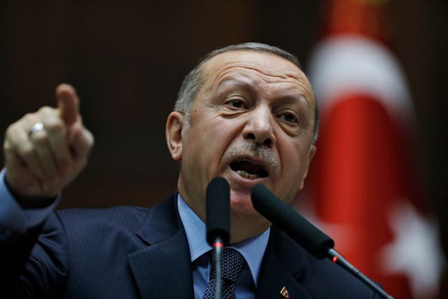 Turkey's President Recep Tayyip Erdogan delivers a speech to MPs of his ruling Justice and Development Party at the parliament  on 8 January 2019.