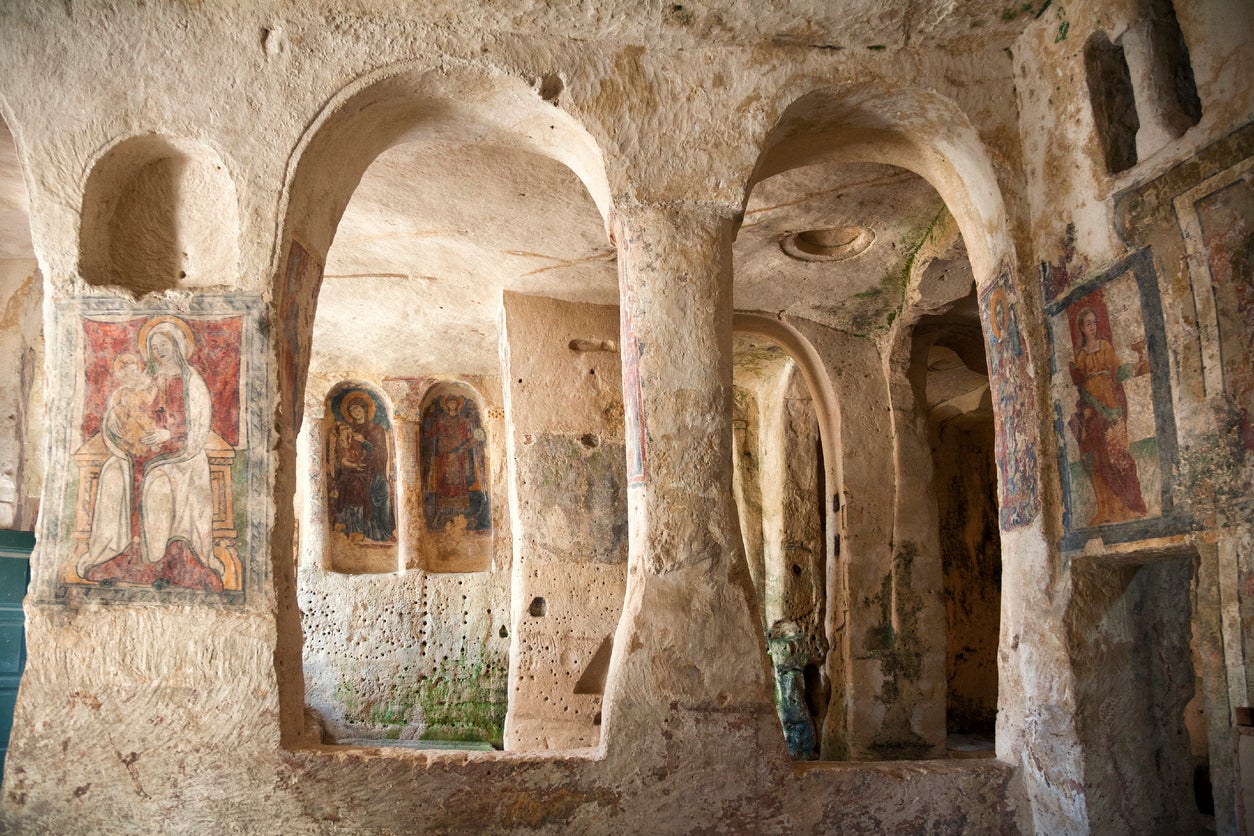 Matera is home to numerous sassi, cave dwellings carved out of limestone (Getty/iStock)