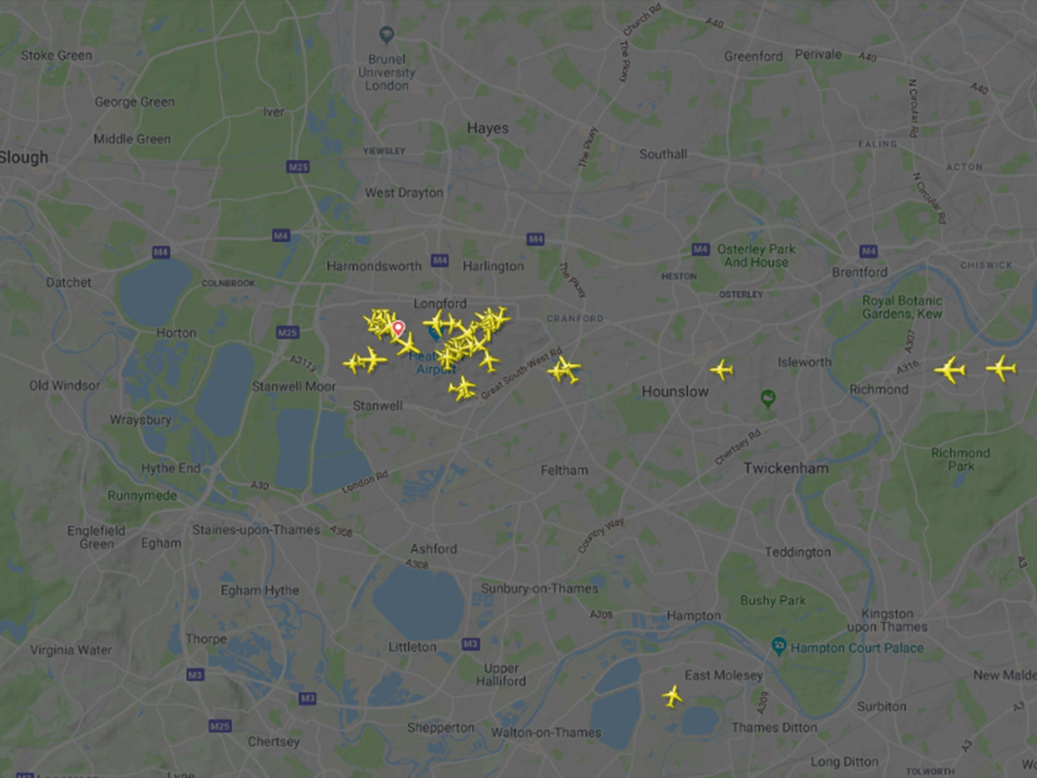 The airspace around Heathrow showing incoming aircraft on the right of the picture; departing planes to the west of the airport have been grounded