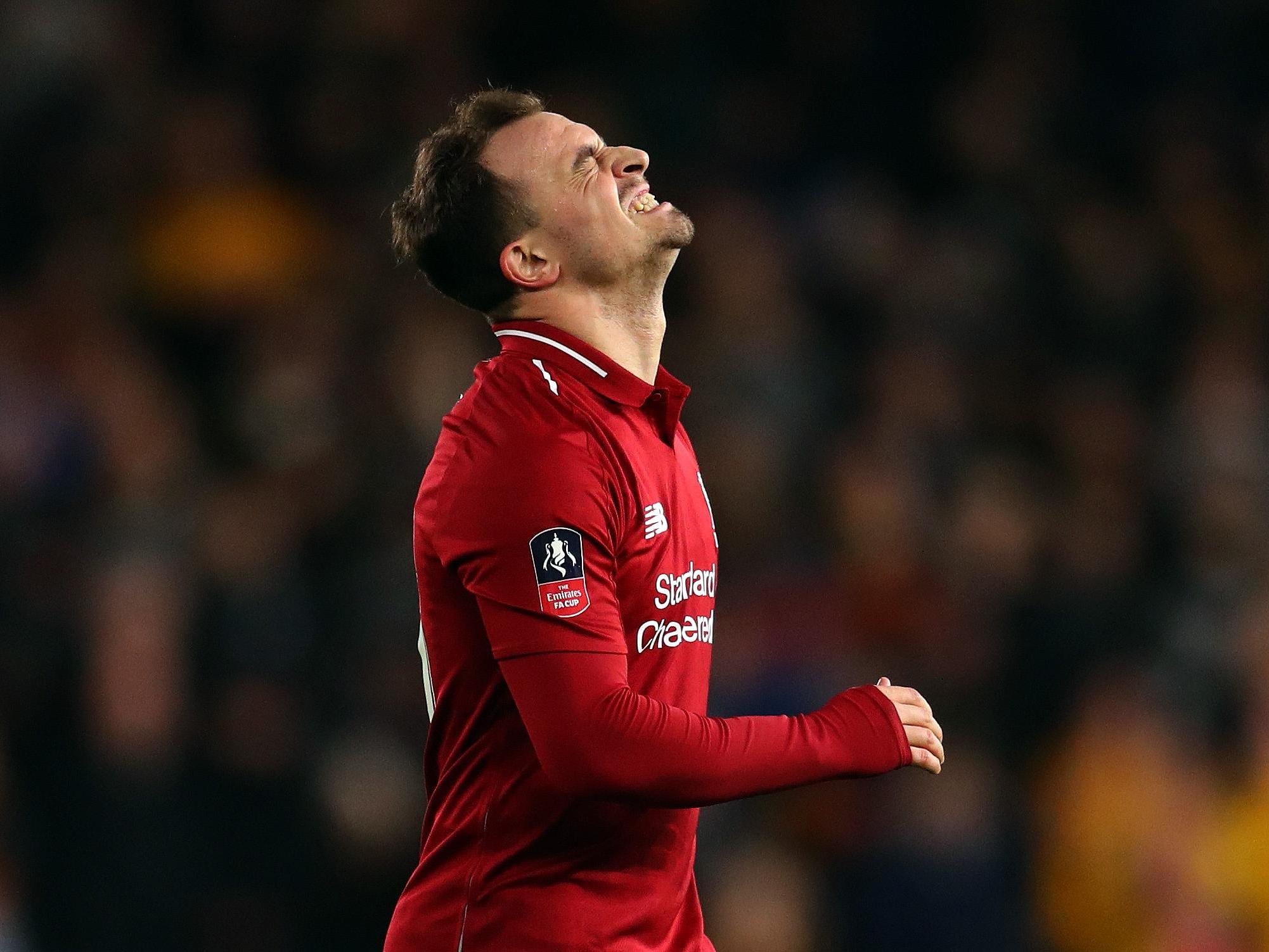 Xherdan Shaqiri congratulates Divock Origi after scoring