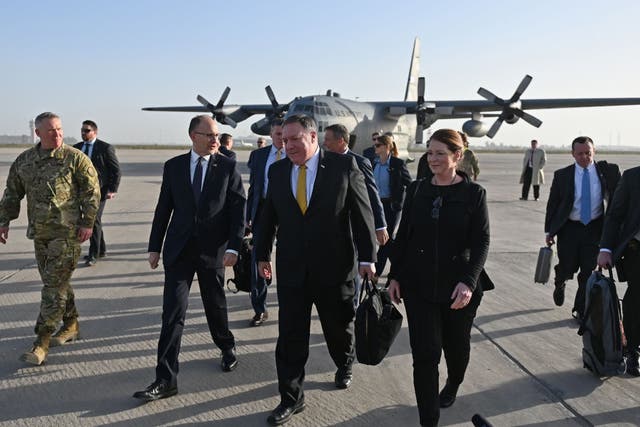 US secretary of state Mike Pompeo and his wife Susan are welcomed by US ambassador to Iraq Douglas Silliman as they arrive in Baghdad, Iraq