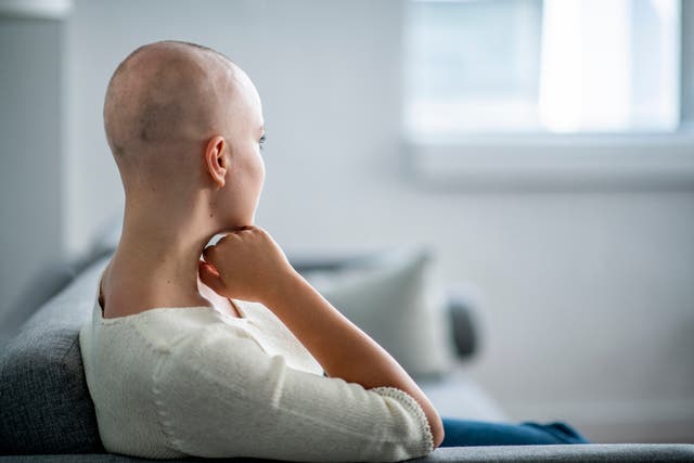 File: Cancer drugs, after entering the blood stream, can damage the brain or cause hair loss