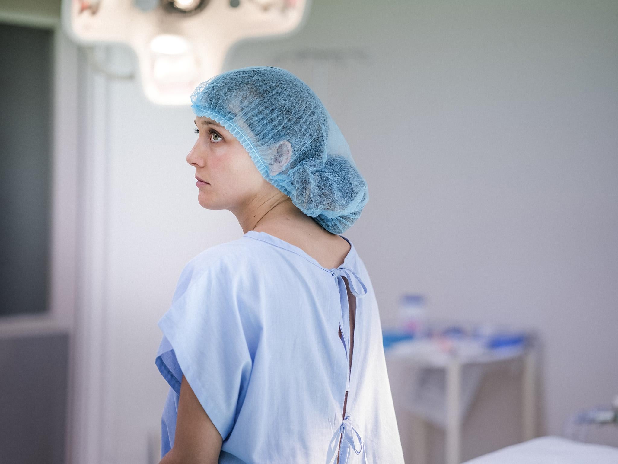 Back open patient gown hi-res stock photography and images - Alamy
