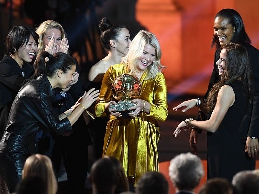 Ada Hegerberg is congratulated after winning the Ballon d'Or