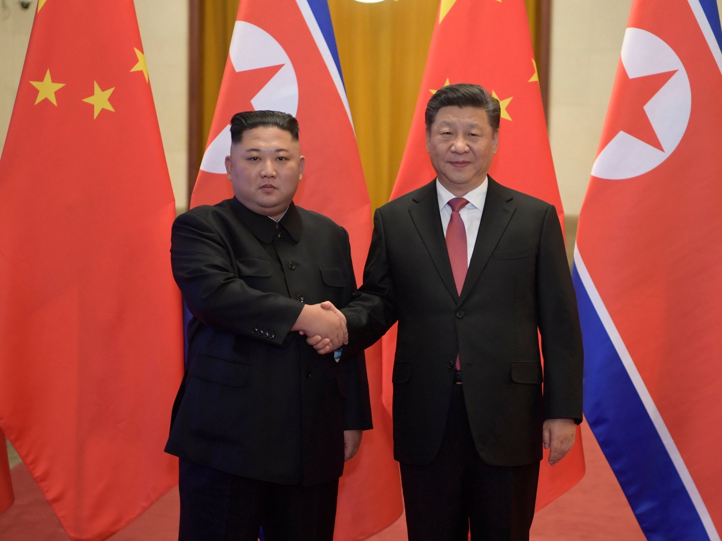 North Korean leader Kim Jong-un (left) and Chinese president Xi Jinping meeting in Beijing on Tuesday