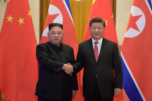 North Korean leader Kim Jong-un (left) and Chinese president Xi Jinping meeting in Beijing on Tuesday