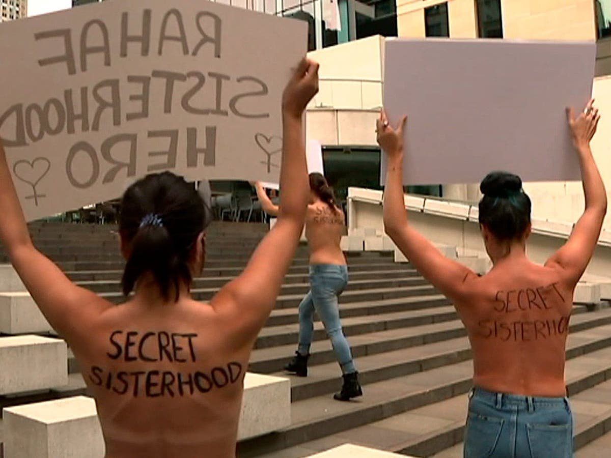 Australian women hold topless protest in support of Saudi teen's asylum bid