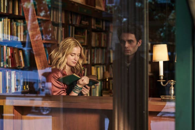 Elizabeth Lail and Penn Badgley in 'YOU'