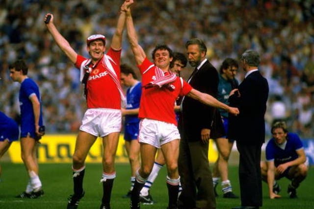 Norman Whiteside (l) and Steve Moran celebrate after United won the FA Cup in 1985