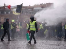 French police clash with yellow vest protesters for ninth weekend